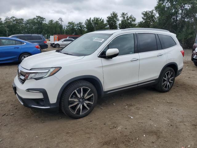 HONDA PILOT TOUR 2020 with VIN 5FNYF6H97LB018959 - Photo from auction