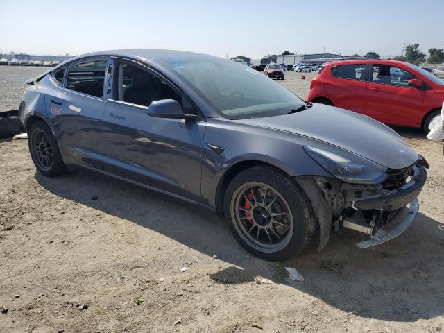 Photo 4 from auction – 2022 TESLA MODEL 3 with VIN 5YJ3E1EC2NF137201