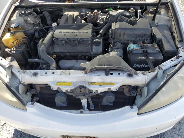 Photo 11 from auction – 2002 TOYOTA CAMRY LE with VIN JTDBF30K920086339