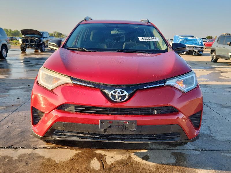 Photo 5 from auction – 2016 TOYOTA RAV4 LE with VIN JTMZFREV3GJ075987