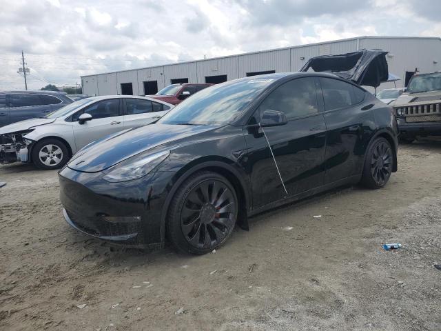 TESLA MODEL Y 2023 with VIN 7SAYGDEF9PF751499 - Photo from auction