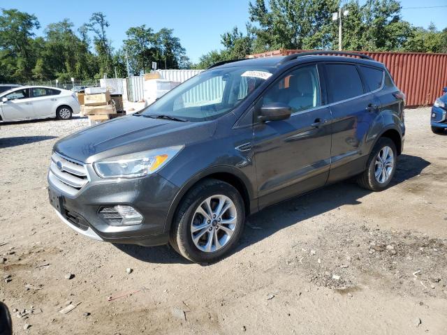 FORD ESCAPE SE 2018 with VIN 1FMCU9GD8JUC66306 - Photo from auction