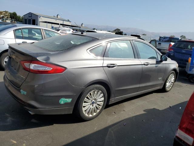 Photo 3 from auction – 2013 FORD FUSION TITANIUM PHEV with VIN 3FA6P0SU4DR297291
