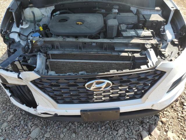 Photo 12 from auction – 2020 HYUNDAI TUCSON LIM with VIN KM8J3CA44LU105793