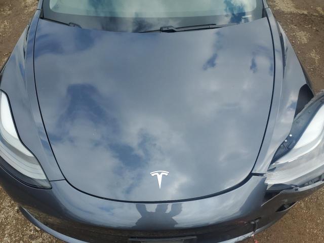 Photo 11 from auction – 2021 TESLA MODEL 3 with VIN 5YJ3E1EB7MF037696