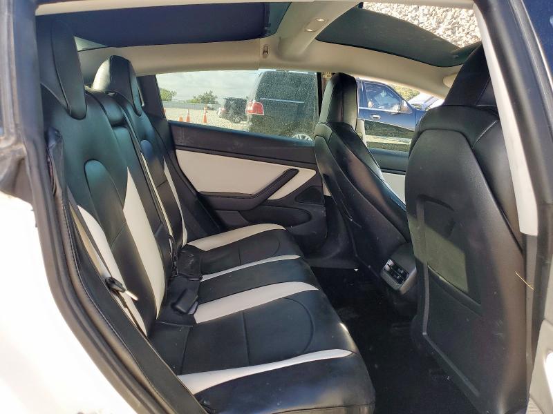 Photo 11 from auction – 2021 TESLA MODEL 3 with VIN 5YJ3E1EA4MF908612