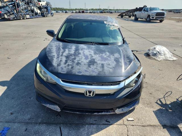 Photo 5 from auction – 2018 HONDA CIVIC LX with VIN 2HGFC2F56JH597976