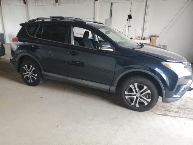 Photo 4 from auction – 2017 TOYOTA RAV4 LE with VIN 2T3ZFREV2HW315873