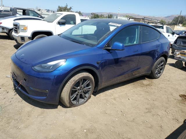 TESLA MODEL Y 2024 with VIN 7SAYGDEE0RF203854 - Photo from auction