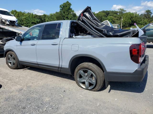 Photo 2 from auction – 2023 HONDA RIDGELINE with VIN 5FPYK3F56PB036604