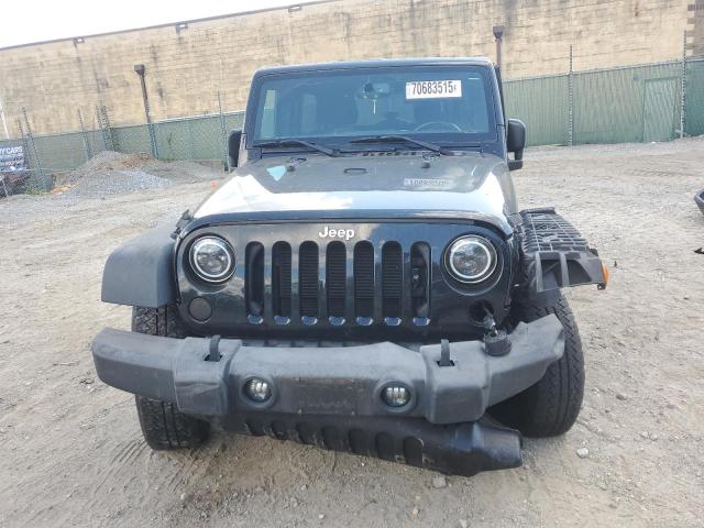 Photo 5 from auction – 2016 JEEP WRANGLER U with VIN 1C4BJWDG2GL130418
