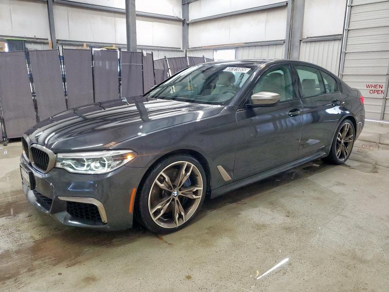 BMW M550XI 2019 with VIN WBAJB9C57KB288887 - Photo from auction