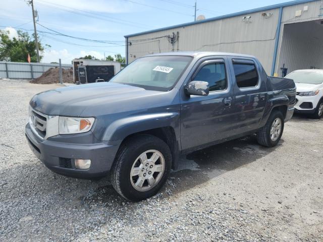 HONDA RIDGELINE 2011 with VIN 5FPYK1F47BB002658 - Photo from auction