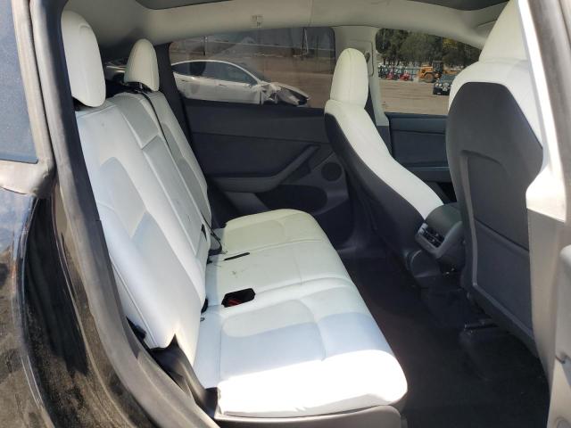 Photo 10 from auction – 2023 TESLA MODEL Y with VIN 7SAYGAEE3PF843052