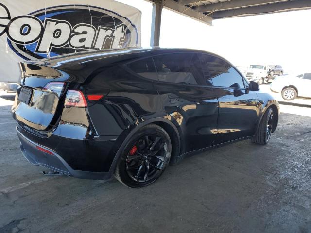 Photo 3 from auction – 2021 TESLA MODEL Y with VIN 5YJYGDEF0MF089143