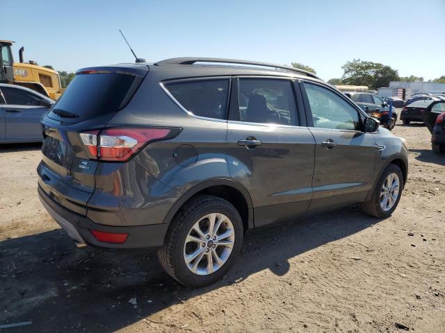 Photo 3 from auction – 2018 FORD ESCAPE SE with VIN 1FMCU9GD8JUC66306