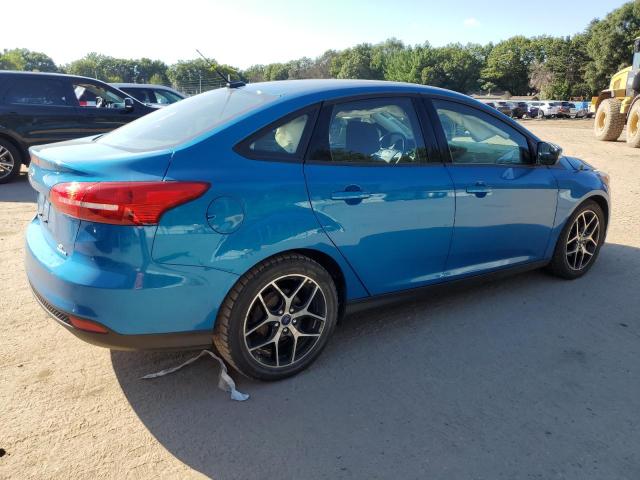 Photo 3 from auction – 2016 FORD FOCUS SE with VIN 1FADP3F21GL305903