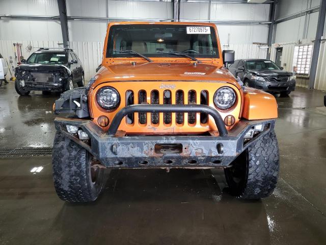 Photo 5 from auction – 2011 JEEP WRANGLER U with VIN 1J4BA5H1XBL572768