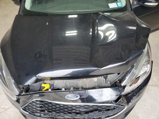 Photo 11 from auction – 2016 FORD FOCUS SE with VIN 1FADP3F28GL233596