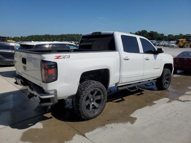 Photo 3 from auction – 2018 CHEVROLET SILVERADO with VIN 3GCUKREC4JG555579