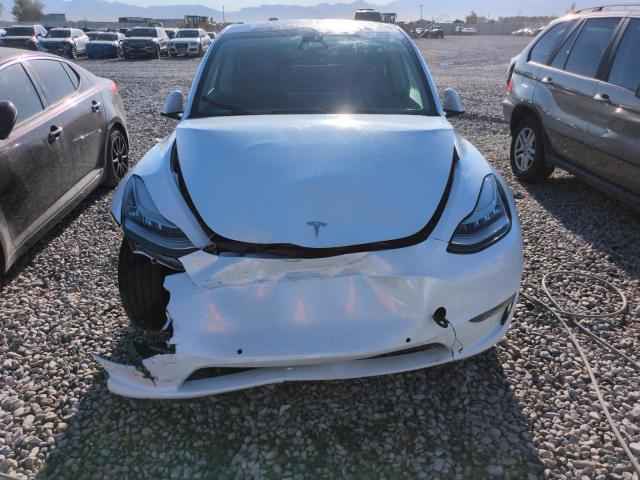 Photo 5 from auction – 2023 TESLA MODEL Y with VIN 7SAYGAEE7PF584467