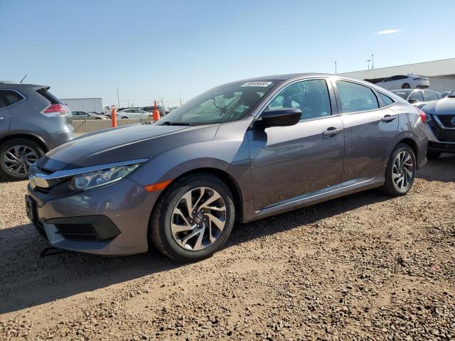 HONDA CIVIC EX 2018 with VIN 2HGFC2F75JH570933 - Photo from auction