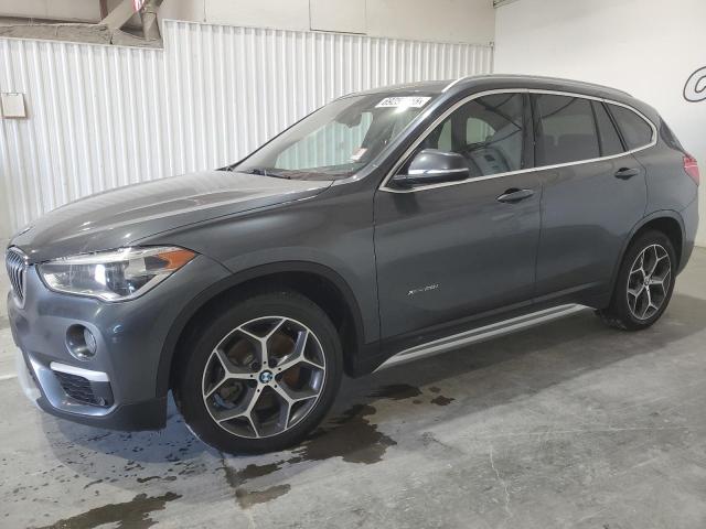 BMW X1 XDRIVE2 2017 with VIN WBXHT3C34H5F70556 - Photo from auction