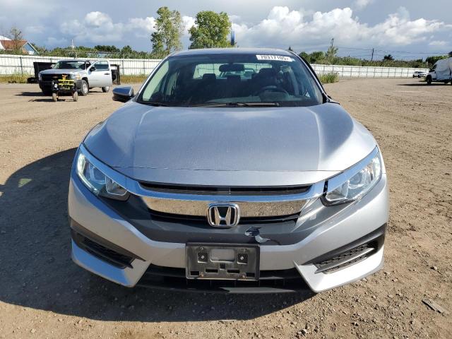 Photo 5 from auction – 2018 HONDA CIVIC EX with VIN 19XFC2F74JE039295