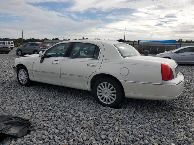Photo 2 from auction – 2003 LINCOLN TOWN CAR E with VIN 1LNHM81W93Y686887