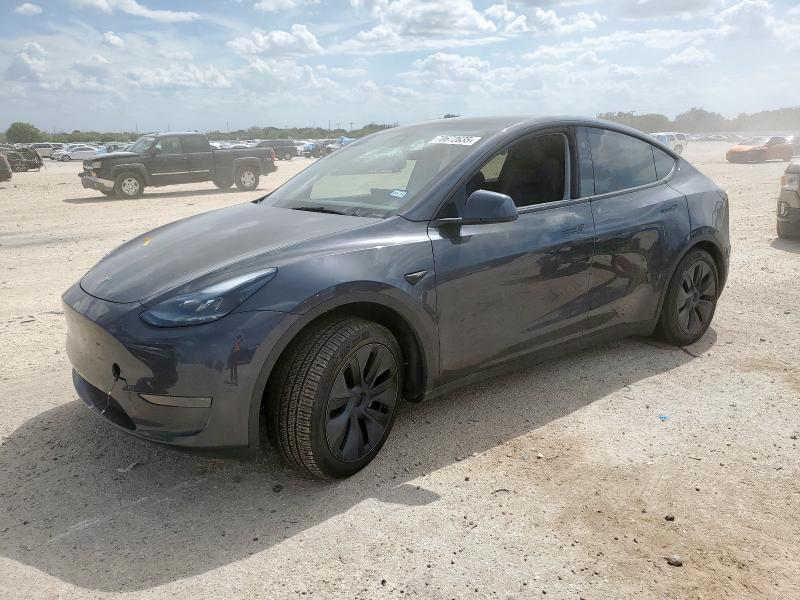 TESLA MODEL Y 2024 with VIN 7SAYGDED1RA322615 - Photo from auction