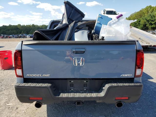 Photo 6 from auction – 2023 HONDA RIDGELINE with VIN 5FPYK3F56PB036604