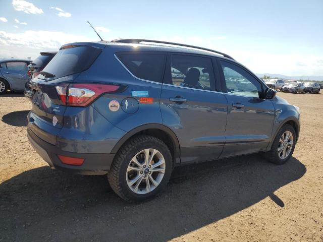 Photo 3 from auction – 2018 FORD ESCAPE SE with VIN 1FMCU9GD7JUB12847