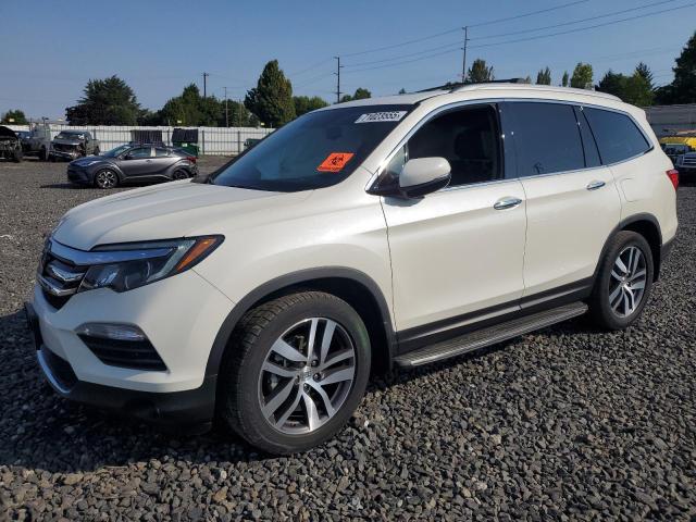 HONDA PILOT TOUR 2018 with VIN 5FNYF6H95JB018018 - Photo from auction