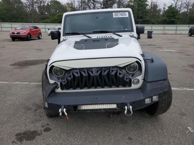 Photo 5 from auction – 2016 JEEP WRANGLER U with VIN 1C4BJWDG0GL242862