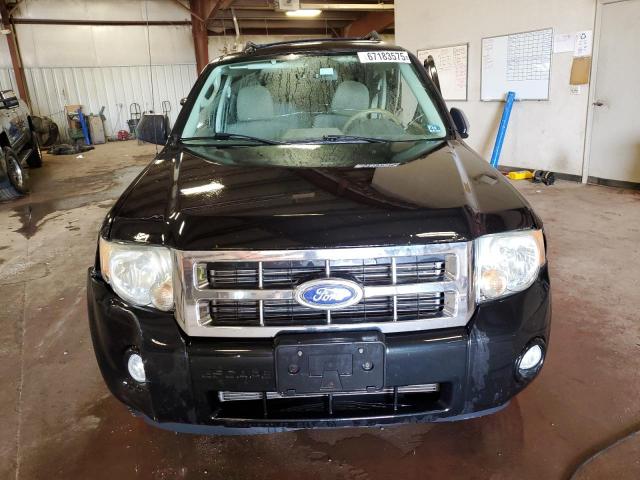Photo 5 from auction – 2011 FORD ESCAPE with VIN 1FMCU0D77BKB89113