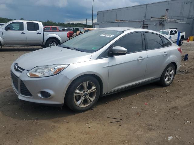 FORD FOCUS SE 2014 with VIN 1FADP3F26EL306719 - Photo from auction