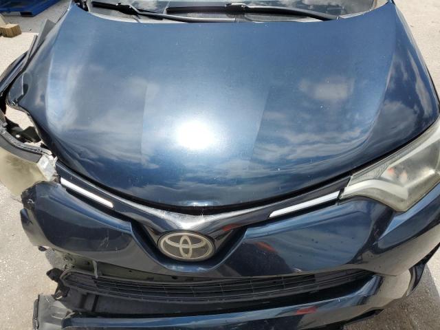 Photo 12 from auction – 2018 TOYOTA RAV4 LE with VIN 2T3ZFREV7JW498743