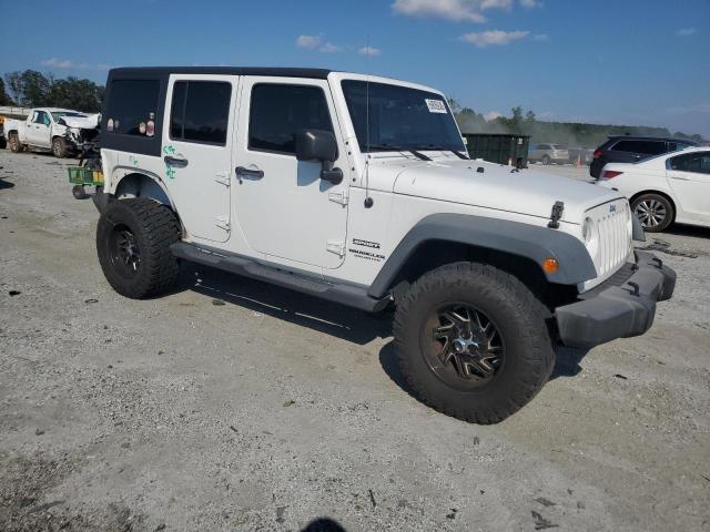 Photo 4 from auction – 2015 JEEP WRANGLER U with VIN 1C4BJWDG6FL652547