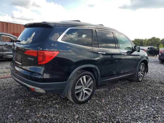 Photo 3 from auction – 2016 HONDA PILOT TOUR with VIN 5FNYF5H98GB057074