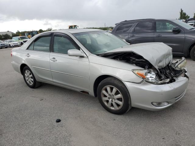 Photo 4 from auction – 2004 TOYOTA CAMRY LE with VIN 4T1BF30K14U571484
