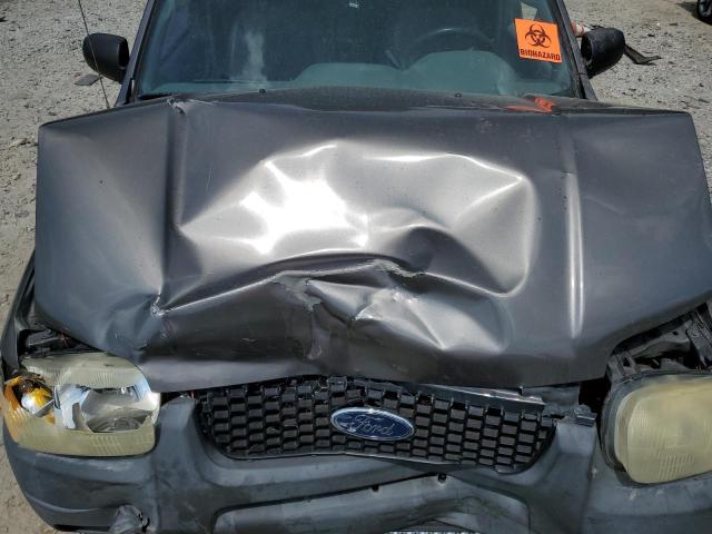 Photo 12 from auction – 2002 FORD ESCAPE XLS with VIN 1FMYU01112KC93652