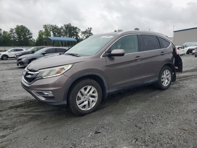 HONDA CR-V 2015 with VIN 2HKRM4H71FH611235 - Photo from auction