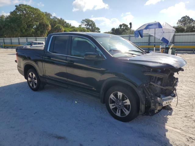 Photo 4 from auction – 2018 HONDA RIDGELINE with VIN 5FPYK3F59JB004589