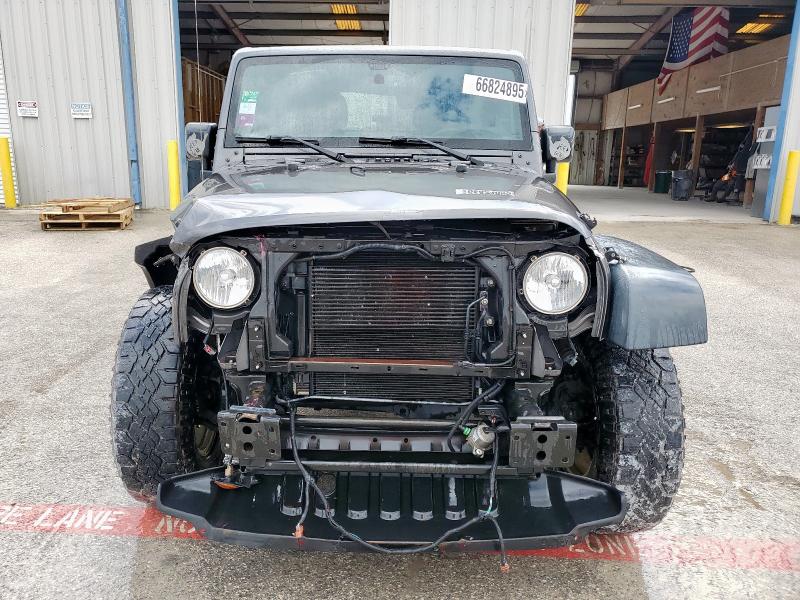 Photo 5 from auction – 2016 JEEP WRANGLER U with VIN 1C4BJWDG3GL338257