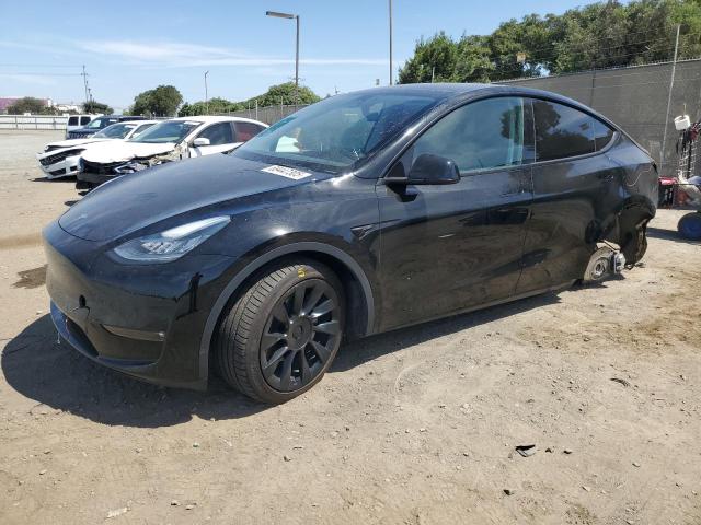 TESLA MODEL Y 2022 with VIN 7SAYGAEE7NF515792 - Photo from auction