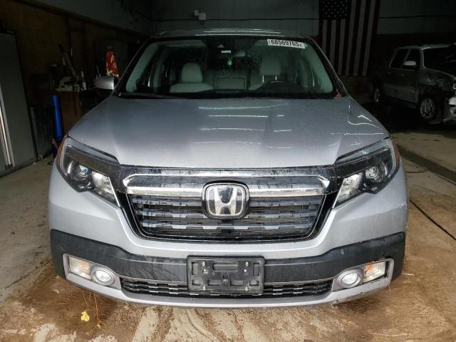 Photo 5 from auction – 2018 HONDA RIDGELINE with VIN 5FPYK3F77JB012899