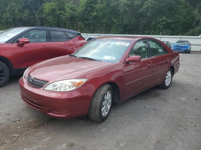TOYOTA CAMRY LE 2002 with VIN 4T1BF30K72U027424 - Photo from auction