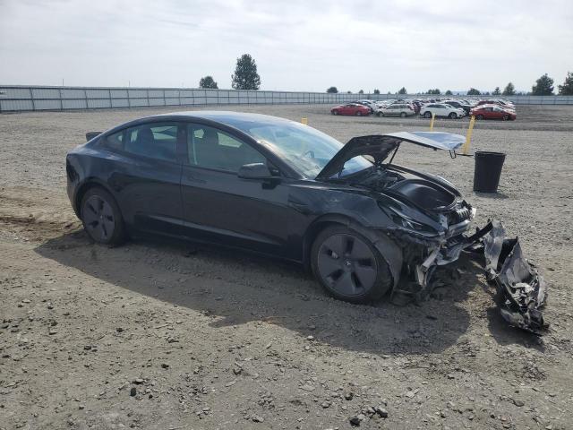 Photo 4 from auction – 2021 TESLA MODEL 3 with VIN 5YJ3E1EB5MF002347
