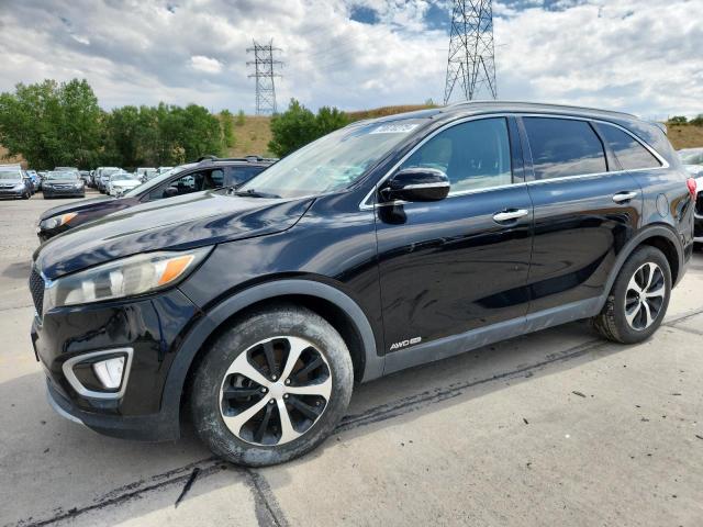 KIA SORENTO EX 2016 with VIN 5XYPHDA54GG143529 - Photo from auction