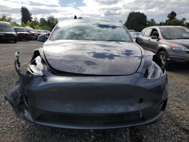 Photo 5 from auction – 2022 TESLA MODEL Y with VIN 7SAYGDEFXNF322563